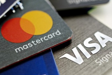 When and where was Visa established; What's the difference with Mastercard?