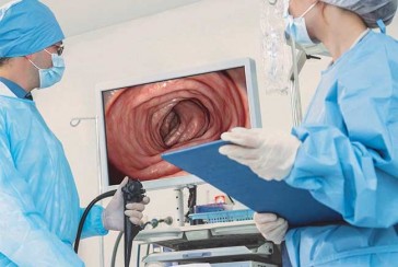 Who and when invented the endoscope for seeing the stomach and intestines?