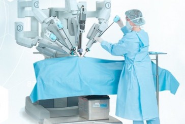 Who and when developed the first robot capable of surgery?