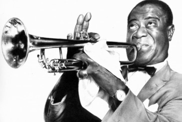 Incarcerated as a child, playing trumpet in the prison band: who is Louis Armstrong?