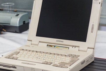 Which brand produced the first commercially successful laptop?