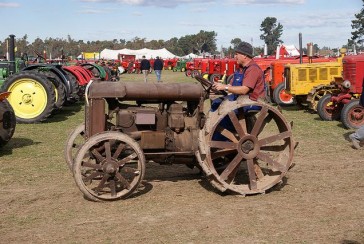 Who are the business people who were tractor manufacturers before entering the automobile industry?