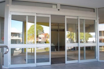 Who and when invented the automatic door?