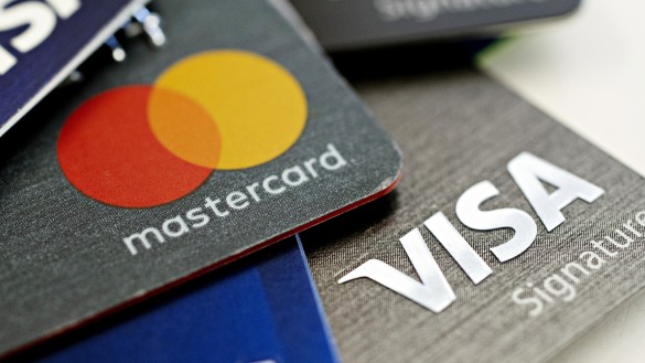 When and where was Visa established; What's the difference with Mastercard?