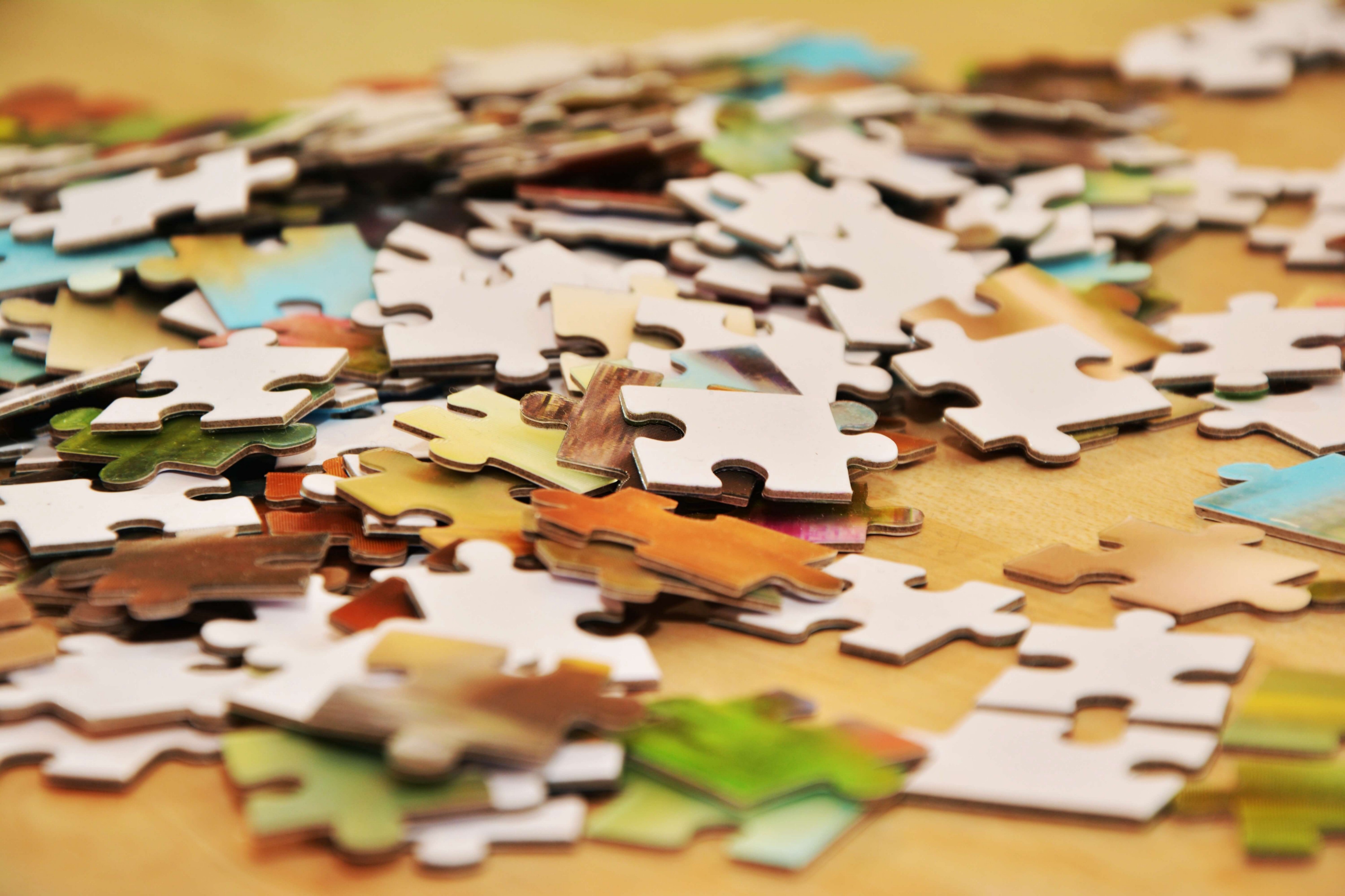 Who invented the jigsaw puzzle and why is it called jigsaw?