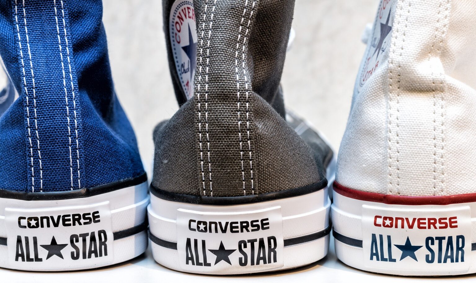 When and by whom was Converse, the symbol of street style, founded?