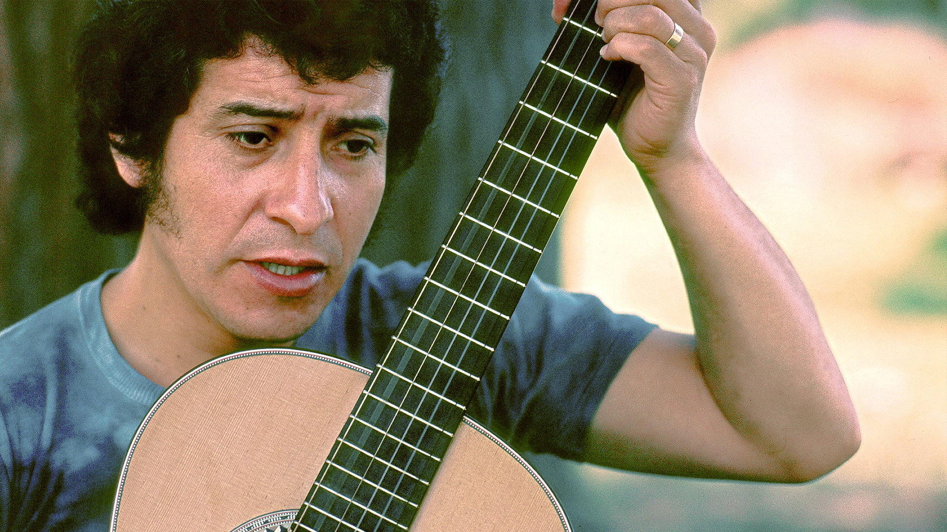 With his guitar in hand, he sang resistance songs at every strike and student action: Who is Victor Jara?