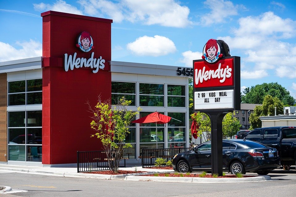 Fast-food brand using the first "drive-in window": The story of Wendy's